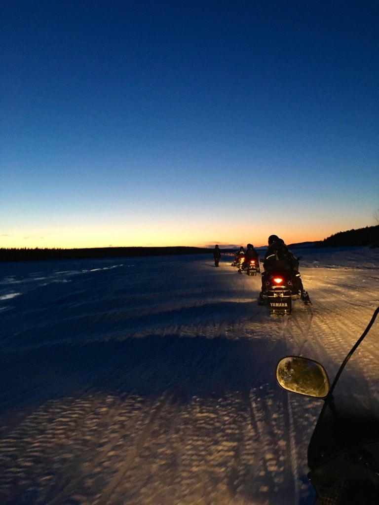 Night time skiddo ride Ice Hotel Lady Trekking