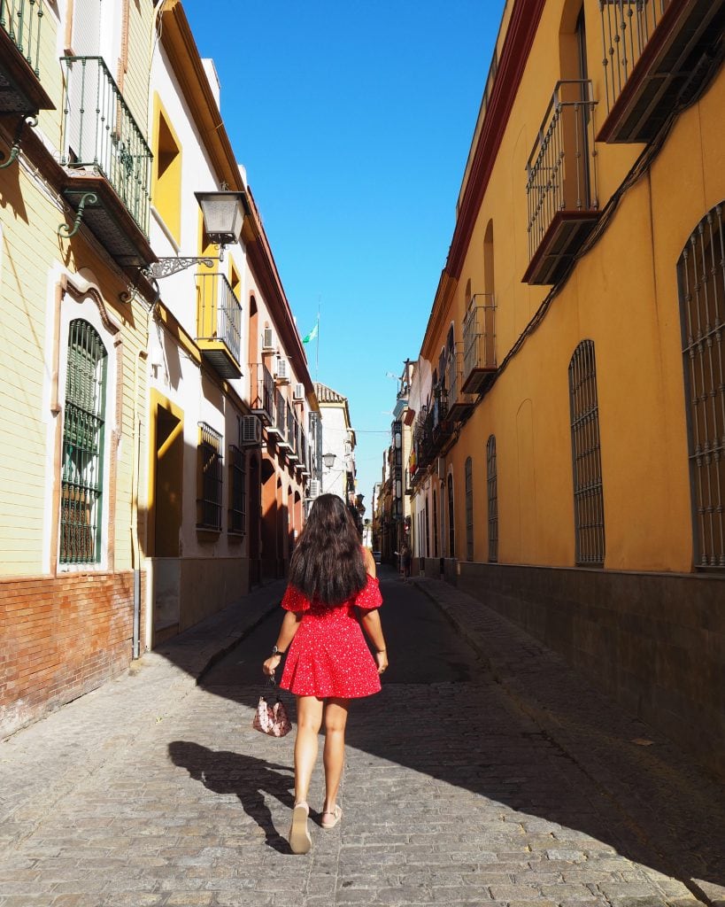 bonnie rakhit style traveller street scene girl in spanish city seville
