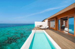 swimming pool deck at water villa westin maldives